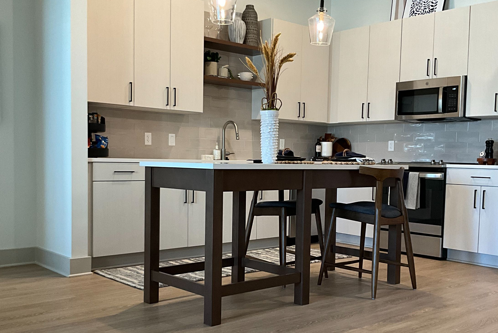 Cobalt Surfaces Commercial LVT Katanga Myrtle Installed in a Multifamily Kitchen